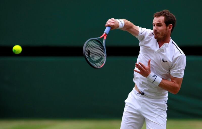 FILE PHOTO: Tennis - Wimbledon - All England Lawn Tennis and Croquet Club, London, Britain - July 9, 2019  Britain's Andy Murray in action during his second round mixed doubles match against France's Fabrice Martin and Raquel Atawo of the U.S.   REUTERS/Andrew Couldridge/File Photo