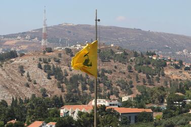 A Hezbollah flag flutters, as seen from the Marjayoun area in southern Lebanon on Friday. Reuters