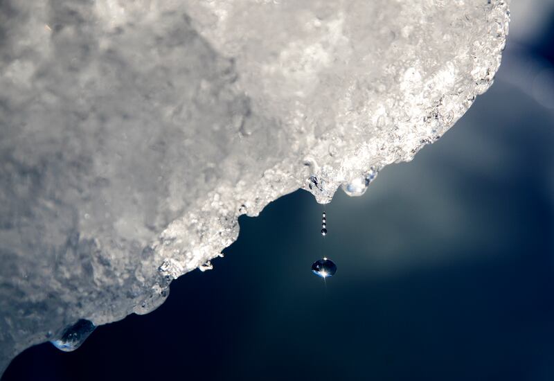 A drop of water falls off a melting iceberg in the Nuup Kangerlua Fjord near Nuuk in south-western Greenland. Greenland’s ice sheet is melting four times faster than in 2003 and is losing 270 billion tonnes of ice mass a year. AP