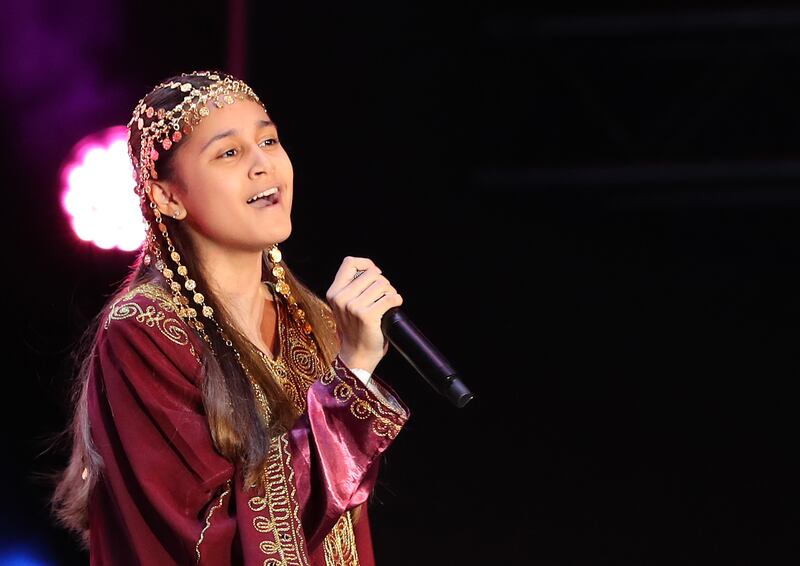 A singer from the Siwar Choir performs at Qatar Day in Jubilee Park, Expo 2020 Dubai