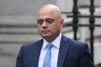 Britain's Chancellor of the Exchequer Sajid Javid walks at 10 Downing Street in central London on February 13, 2020.  British Finance Minister Sajid Javid resigned on Thursday, in a shock move that deals a blow to Prime Minister Boris Johnson's government just weeks after Brexit and a month before the annual budget / AFP / Isabel Infantes
