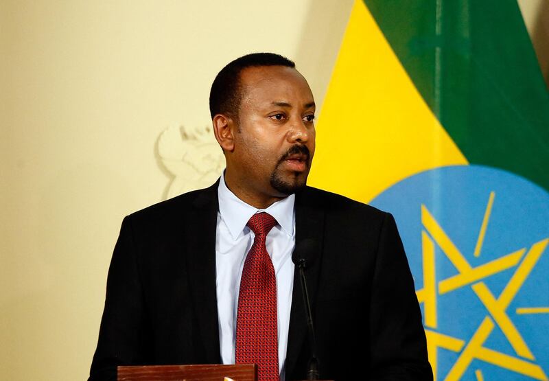 (FILES) In this file photo taken on January 12, 2020 Prime Minister of Ethiopia Abiy Ahmed Ali (L) speaks during a press conference with South African President at the Union Buildings in Pretoria, following their meeting on matters of mutual national development, regional and continental issues as well as international developments. Ethiopian Prime Minister Abiy Ahmed said on March 23, 2021 his country did not want war with Sudan, as tensions over a contested region along their border spark fears of broader conflict. / AFP / Phill Magakoe
