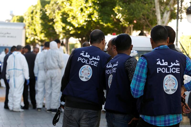 Policemen secure the area as forensic experts work near the site of an explosion in the center of the Tunisian capital Tunis, Tunisia October 29, 2018. REUTERS/Zoubeir Souissi