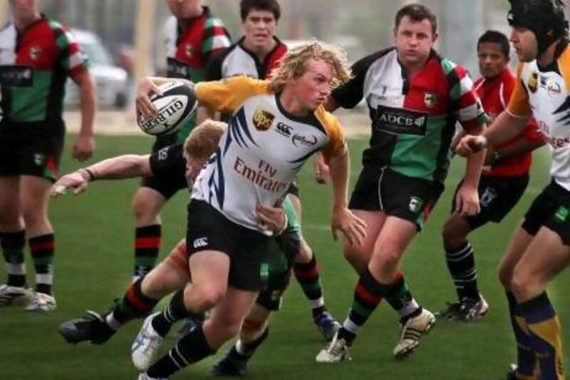 Chris Gregory, centre, and the Dubai Hurricanes won the Premiership last season.