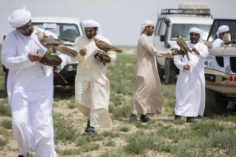 Falconers from the private office of HH Sheikh Mohammed bin Zayed al Nahyan release falcons back into the wild in Aktau, Kazakhstan. Silvia Razgova / The National