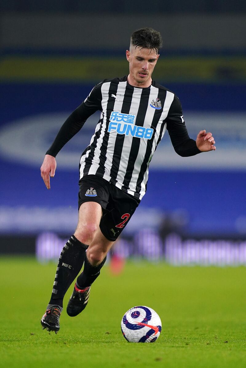 BRIGHTON, ENGLAND - MARCH 20: Ciaran Clark of Newcastle United runs with the ball during the Premier League match between Brighton & Hove Albion and Newcastle United at American Express Community Stadium on March 20, 2021 in Brighton, England. Sporting stadiums around the UK remain under strict restrictions due to the Coronavirus Pandemic as Government social distancing laws prohibit fans inside venues resulting in games being played behind closed doors. (Photo by John Walton - Pool/Getty Images)