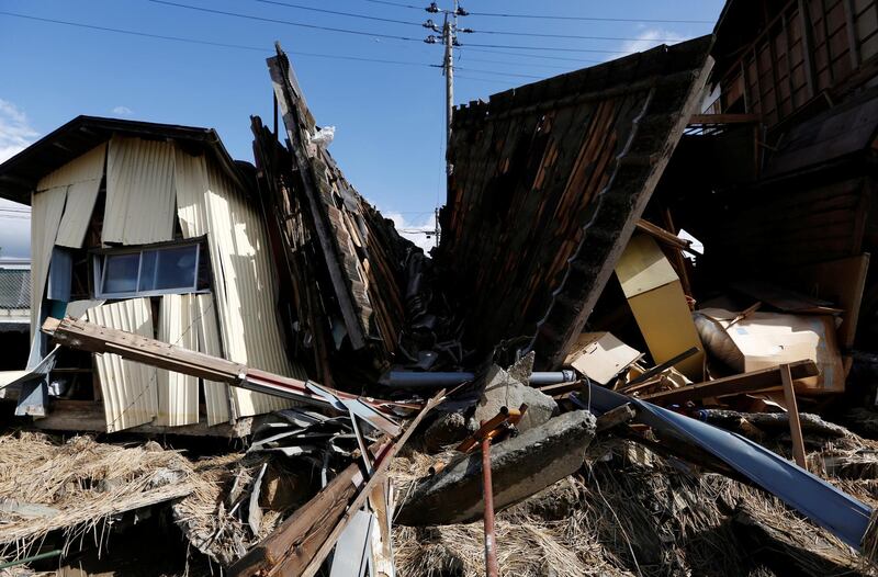 Destroyed houses are seen, in the aftermath of Typhoon Hagibis, in Koriyama, Fukushima prefecture, Japan. REUTERS