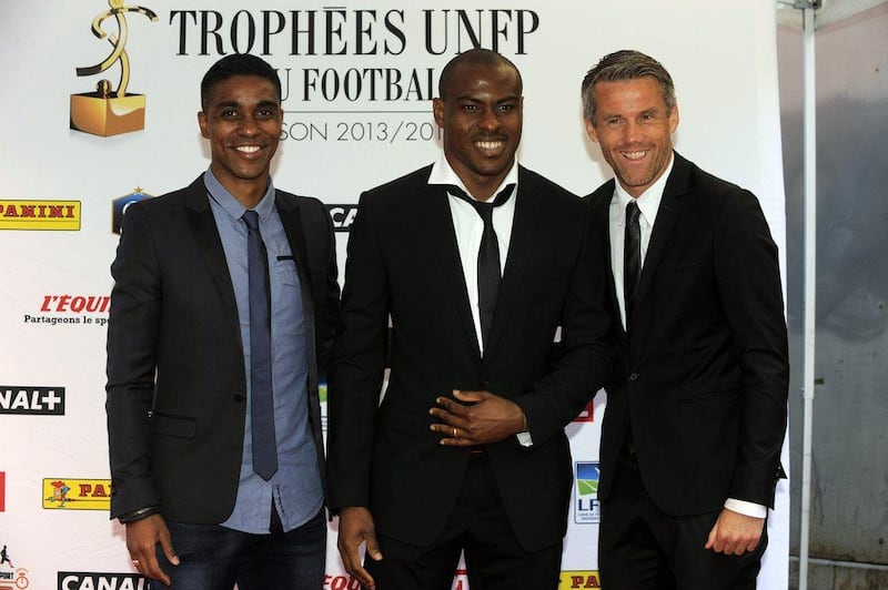 Vincent Enyeama, centre, with Franck Beria and Mickael Landreau at the Ligue 1 awards ceremony. Jean Marie Hervio / AFP / DPPI