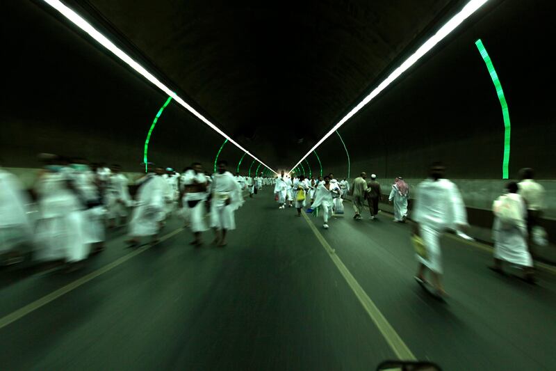 Thousands of Muslim pilgrims head to Mina after Friday prayer at the Grand Mosque, in Mecca, Saudi Arabia, Friday, Nov. 4, 2011. The annual Islamic pilgrimage draws three million visitors each year, making it the largest yearly gathering of people in the world. The Hajj will begin on November 5. (AP Photo/Hassan Ammar) *** Local Caption ***  Mideast Saudi Arabia Hajj.JPEG-05eb4.jpg