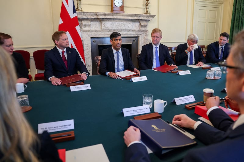 Mr Sunak chairs an Illegal Migration Operations Committee meeting at 10 Downing Street. AFP