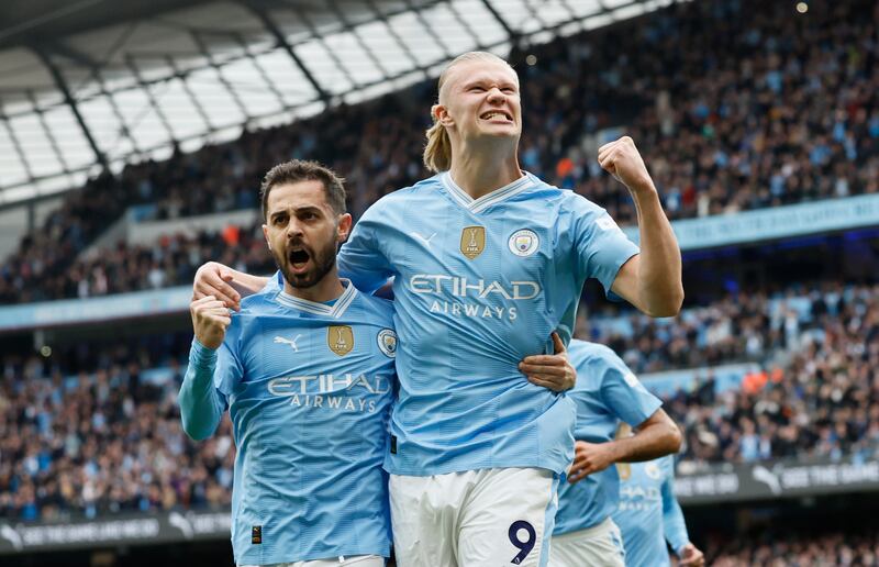 Manchester City's Erling Haaland celebrates with Bernardo Silva after scoring their first goal in the 5-1 Premier League victory over Wolverhampton Wanderers at the Etihad Stadium on Saturday, May 4, 2024. PA 