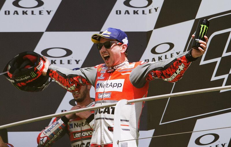 SCARPERIA, ITALY - JUNE 03:  Jorge Lorenzo of Spain and Ducati Team celebrates the victory on the podium at the end of the MotoGP race during the MotoGp of Italy - Race at Mugello Circuit on June 3, 2018 in Scarperia, Italy.  (Photo by Mirco Lazzari gp/Getty Images)