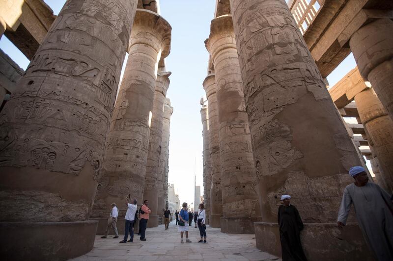 A picture issued on 24 December 2017, shows tourists walking at the hall of columns at the Karnak Temple, in Luxor, Upper Egypt, 08 December 2017. Photo by: Gehad Hamdy/picture-alliance/dpa/AP Images
