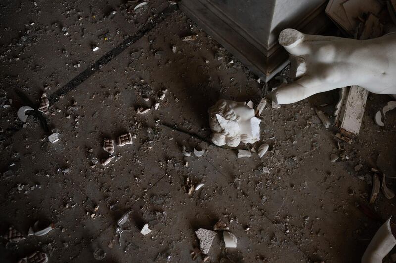 A broken statue from the 19th century lays on the floor of the Sursock Palace. AP Photo