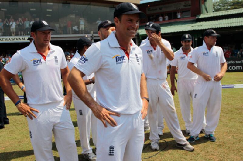England's cricket captain Andrew Strauss, center front, along with his teammates, smiles at the end of the second test cricket match between England and Sri Lanka in Colombo, Sri Lanka , Saturday, April 7, 2012. (AP Photo/Eranga Jayawardena)