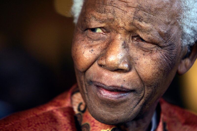 Former South Africa President Nelson Mandela formally announces his retirement from public life in Johannesburg in this June 1, 2004 file photo. Mandela is undergoing specialised tests in hospital and there is no reason to panic over his health, Deputy President Kgalema Motlanthe said on Friday. Mandela, 92, was admitted to hospital on Wednesday, prompting fears for the anti-apartheid icon who led South Africa as its first black president and is revered at home and abroad as a symbol of reconciliation and hope.  REUTERS/Mike Hutchings/Files (SOUTH AFRICA - Tags: HEADSHOT POLITICS HEALTH) *** Local Caption ***  MDL09_SAFRICA MANDE_0128_11.JPG