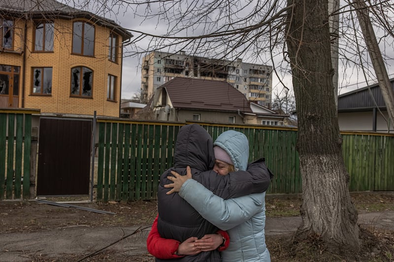 Vladyslava Liubarets, a Bucha resident, cries as she hugs her sister whom she had not seen since the beginning of the Russian invasion, in Bucha, the town which was retaken by the Ukrainian army. EPA