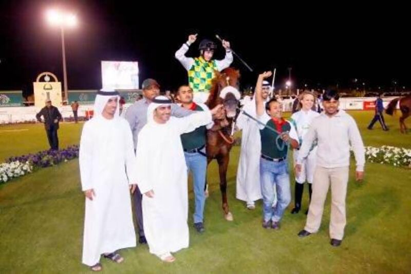 Naseem, ridden by Harry Bentley, won The President of the UAE Cup in a photo finish against last year's winner Nieshan last night. Jake Badger for The National