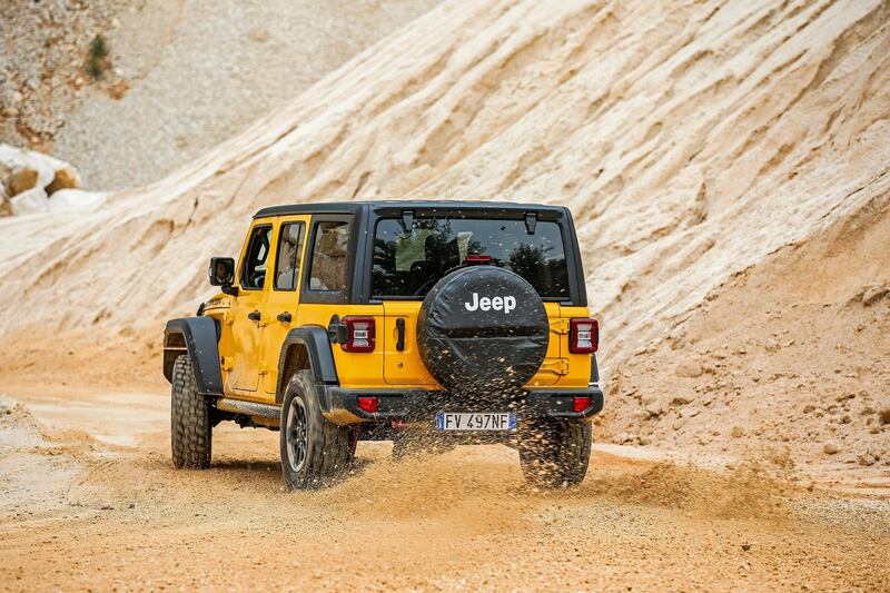 A Wrangler driver tries to hang on to the car's back end on the test track.