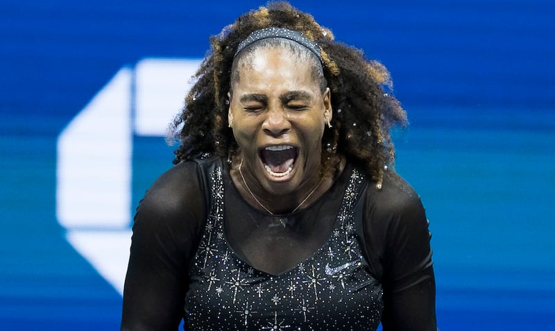 Serena Williams react after losing a point on Friday night. EPA