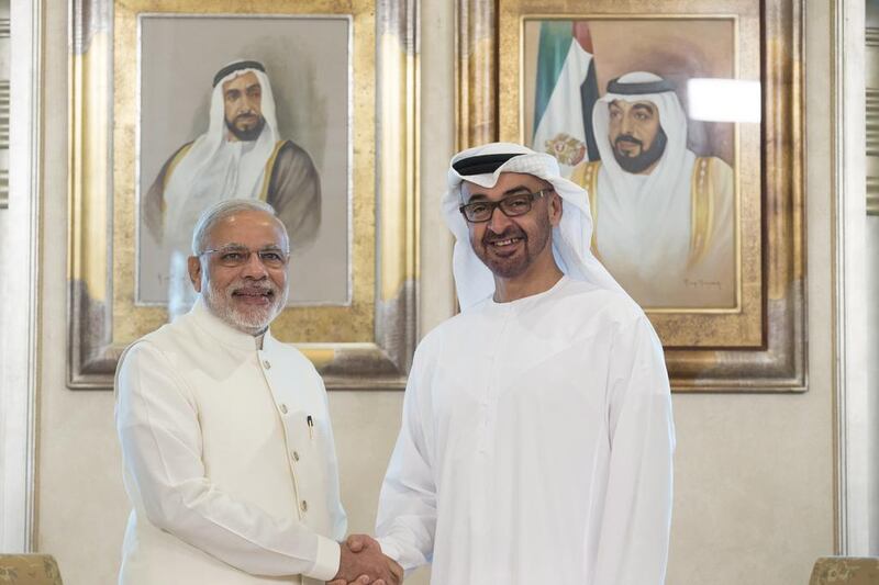 Sheikh Mohammed bin Zayed, Crown Prince of Abu Dhabi and Deputy Supreme Commander of the UAE Armed Forces, right, with Narendra Modi, India's prime minister before their meeting at Emirates Palace. Ryan Carter / Crown Prince Court - Abu Dhabi