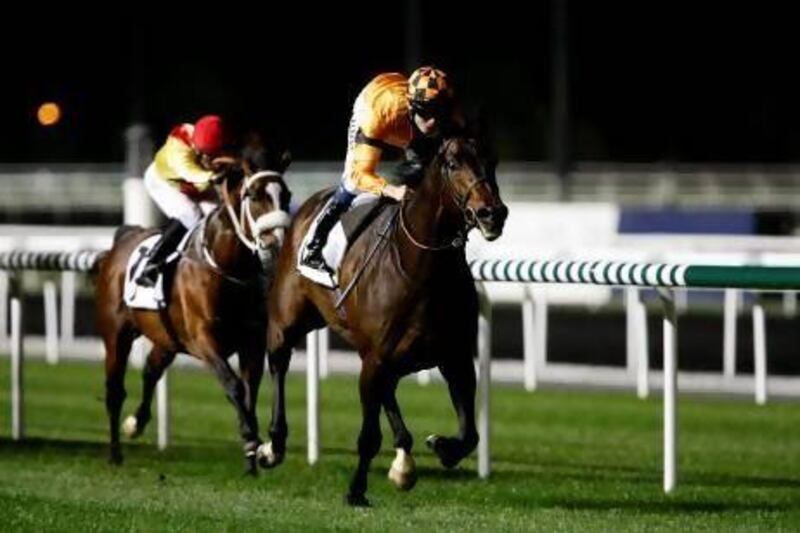 Jamie Spencer took Trade Storm, right, from the back of the field to the winner's circle in the Zabeel Mile at Meydan Racecourse.