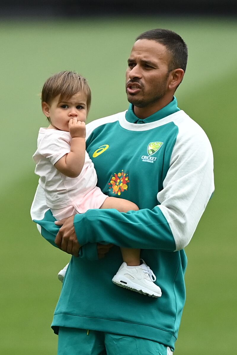 Usman Khawaja and daughter Aish. EPA