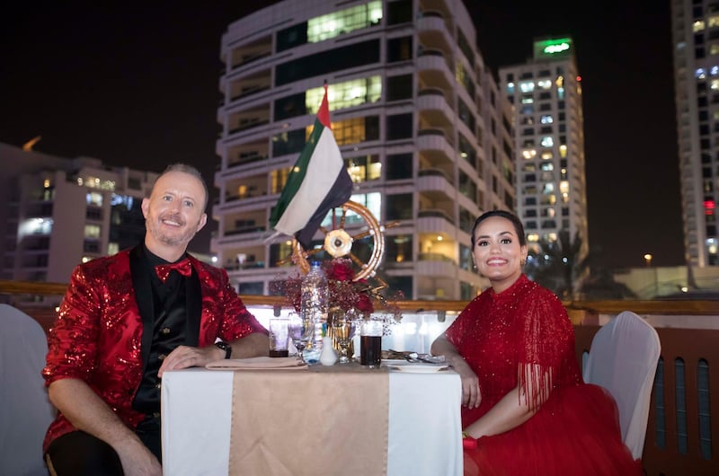 Dubai, United Arab Emirates - Richard the man behind the Big Ticket draw with Bouchra Yamani at the gathering of of Abu Dhabi Big Ticket winners at Alexandra Dhow Cruise, Dubai Marina.  Leslie Pableo for The National for Sarwat Nasir's story