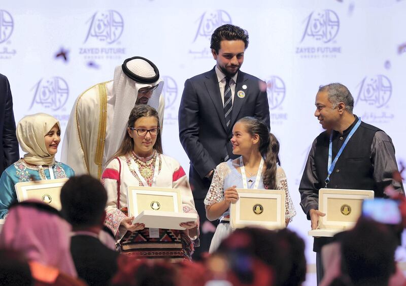 Abu Dhabi, United Arab Emirates - January 15th, 2018: Sheikh Mohammed bin Zayed Al Nahyan with the winners at the Sheikh Zayed Future Energy Prize awards ceremony as part of Abu Dhabi Sustainability Week. Monday, January 15th, 2018 at Abu Dhabi National Exhibition Centre (ADNEC), Abu Dhabi. Chris Whiteoak / The National