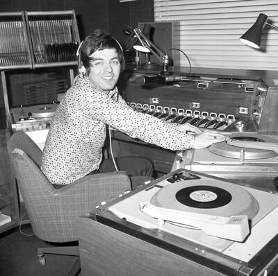 DJ Tony Blackburn, who is presenting his Radio One programme a few hours before his wedding to actress Tessa Wyatt.
