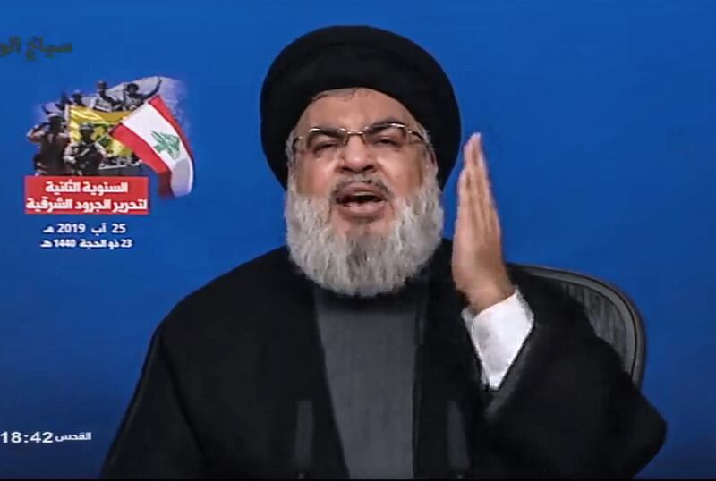 epa07793531 A handout video grab made available from al-Manar TV shows Hezbollah Secretary General Hassan Nasrallah delivering a speech on the second anniversary of defeating Islamic State (IS) militants in the Arsal mountains, from an undisclosed location, 25 August 2019. According to reports, Nasrallah spoke about the situation in the Palestinian territories, Lebanon, Syria, and other Arab countries, and threatened Israel with a 'painful response', saying that from now on they will down Israeli drones in Lebanese skies, hours after Hezbollah media office in Beirut was reportedly targeted by an Israeli drone.  EPA/AL-MANAR TV GRAB HANDOUT  HANDOUT EDITORIAL USE ONLY/NO SALES