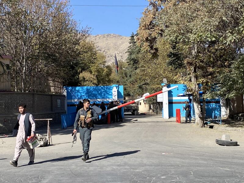 Afghan security officials stand guard during an attack at Kabul University in Kabul, Afghanistan. At least four persons were wounded after gun battle erupted at the University in Kabul.  EPA