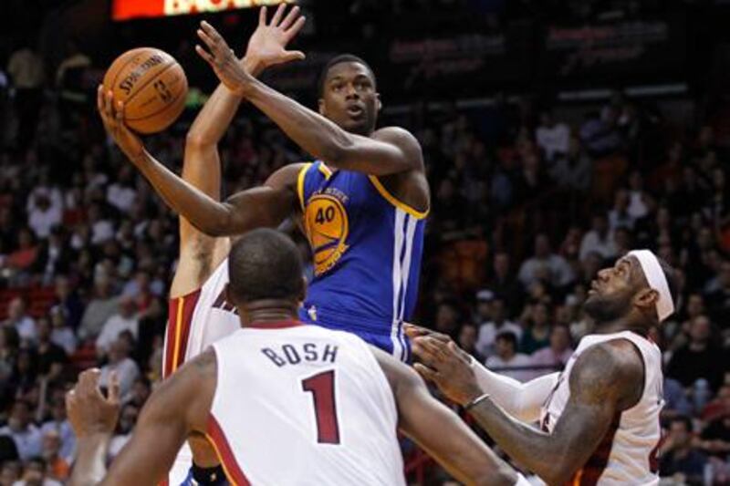 Golden State Warriors' Harrison Barnes shoots against Miami Heat.