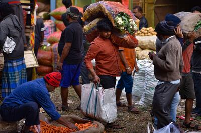 A vegetable market in Bengaluru. Growth in India is projected to remain strong at 6.5 per cent in 2024 and 2025, driven by domestic demand. AFP