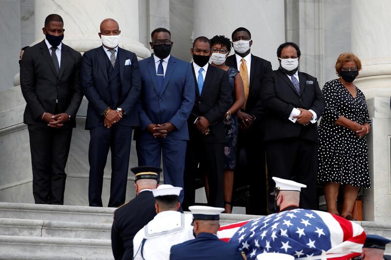 The flag-draped casket of John Lewis is carried by a joint services military honour guard to lie in state  in Washington, DC. REUTERS