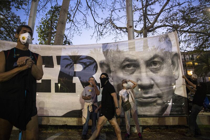 Israelis protest at a rally in Rabin Square on April 19, 2020 in Tel Aviv, Israel. Getty Images