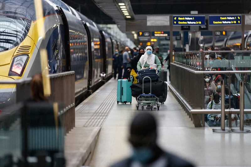 Travelers disembark from the Eurostar train from Paris at St Pancras International station in London. The UK is set to overhaul its international travel rules, easing the burden on passengers and giving a boost to the beleaguered industry. Getty Images