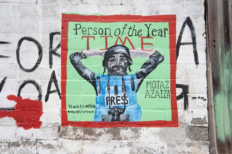 A mural honouring journalists in Gaza, painted on a wall in Bo-Kaap, Cape Town. AFP