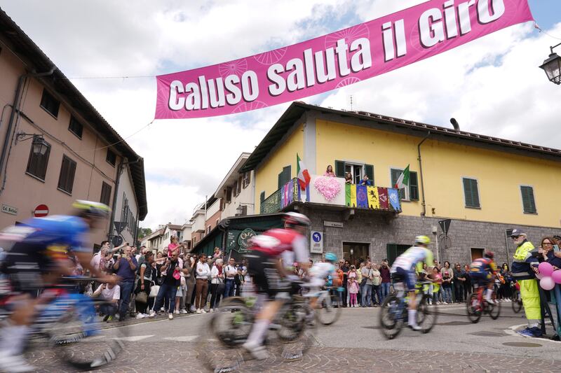 The peloton ride in the city of Caluso during stage 2 of the Giro d'Italia. AP