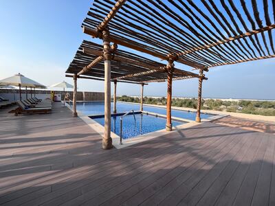 A lap pool overlooks the ocean 