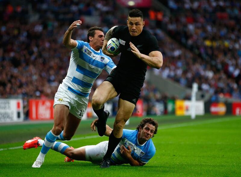 Sonny Bill Williams of the New Zealand All Blacks evades a challenge from Juan Imhoff, left, and Nicolas Sanchez of Argentina during a 2015 Rugby World Cup Pool C match. Williams is expected to appear at the Dubai Rugby Sevens this weekend. (Photo by Mike Hewitt/Getty Images)