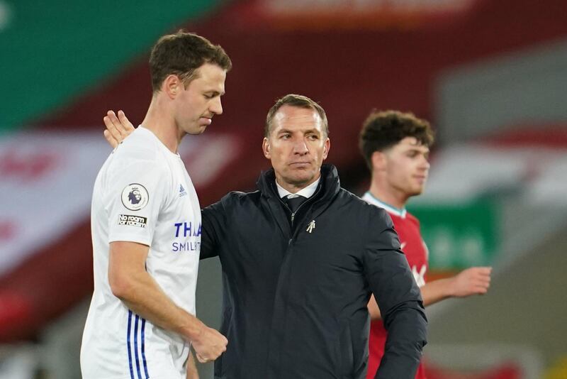 Leicester manager Brendan Rodgers with Jonny Evans after the final whistle. AFP