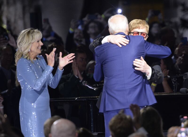 Jill Biden applauds as US President Joe Biden embraces Sir Elton John during the event at the White House in Washington. UPI
