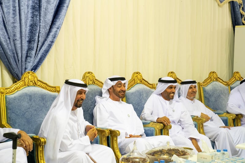 Al AIN, ABU DHABI, UNITED ARAB EMIRATES - December 16, 2018: HH Sheikh Mohamed bin Zayed Al Nahyan, Crown Prince of Abu Dhabi and Deputy Supreme Commander of the UAE Armed Forces (2nd L), offers condolences to the family of Abdulla bin Jaber Al Khaili, in Al Ain.

( Mohamed Al Hammadi / Ministry of Presidential Affairs )
---