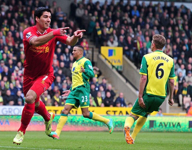 2013/14 - Luis Suarez (Liverpool): 37 appearances, 31 goals. AFP