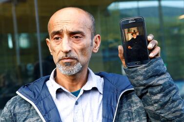 Omar Nabi speaks to the media about losing his father Haji Daoud in the mosque attacks, at the district court in Christchurch, New Zealand. Reuters