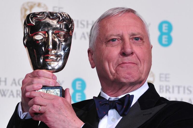 British director Peter Greenaway poses with the outstanding British contribution to cinema award. Carl Court / AFP photo