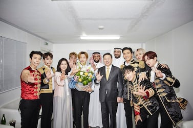 Super Junior posted this photo of the band posing with officials backstage after their successful Jeddah concert. Photo: Twitter/SuperJunior