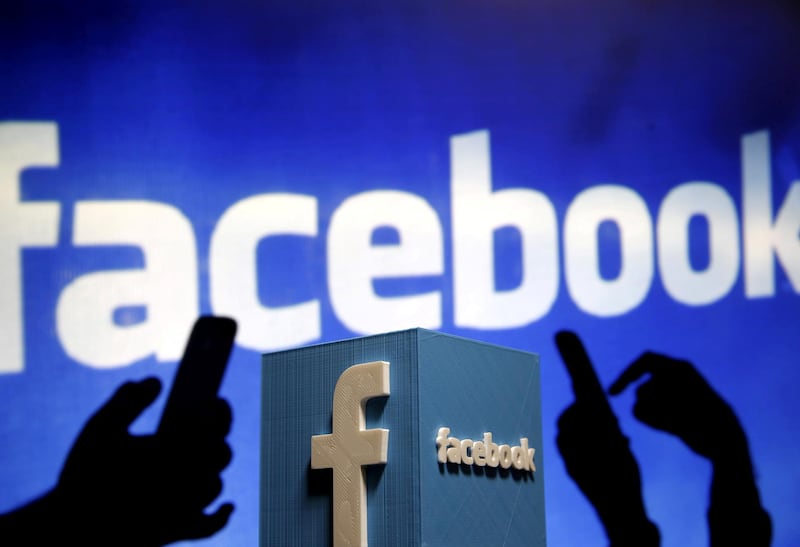 FILE PHOTO: A 3D plastic representation of the Facebook logo is seen in this photo illustration May 13, 2015. To match Analysis INTERNET-POLITICS/ REUTERS/Dado Ruvic/Illustration/File Photo