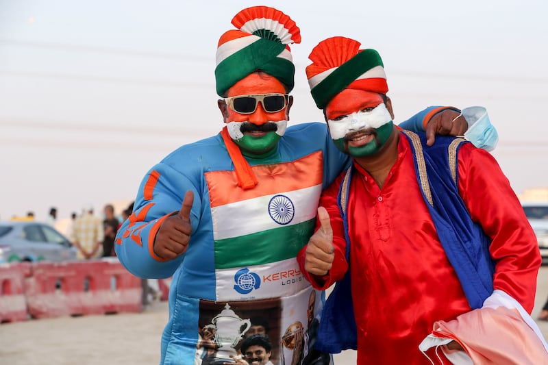 India cricket fans Sugumar Devraj and Vigneshwaran Jothi outside Zayed Cricket Stadium. Khushnum Bhandari /  The National